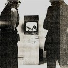 Photograph of spectators watching the screen outside the room for A Change of Plan. (by Tim Burns). Photograph of spectators watching the screen outside the room for A Change of Plan. (by Tim Burns).