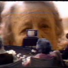 The studio setting while listening to Elsie Mae in a chroma-key playback of an interview with her. (l-r) Lottie, Grandma Rose, Carole Sklan.
The studio setting while listening to Elsie Mae in a chroma-key playback of an interview with her. (l-r) Lottie, Grandma Rose, Carole Sklan.