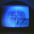 The viewing monitor with an image of Malcolm Fraser printed onto one of the balloons in a cctv camera shot. The viewing monitor with an image of Malcolm Fraser printed onto one of the balloons in a cctv camera shot.
