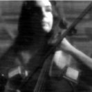 Moorman with the TV Bra (video still) Moorman with the TV Bra (video still)