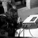 Albie Thoms at the Akai portapak, outside the Yellow House. Frame from Akai Ghost Poems an edit of the Yellow TV tapes by Albie Thoms (1971). Albie Thoms at the Akai portapak, outside the Yellow House. Frame from Akai Ghost Poems an edit of the Yellow TV tapes by Albie Thoms (1971).