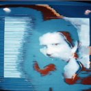 Frame from the SPK video with close up of Neil Hill. Frame from the SPK video with close up of Neil Hill.